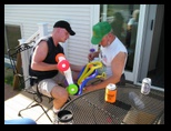 Pa and Grandpa assemble a toy