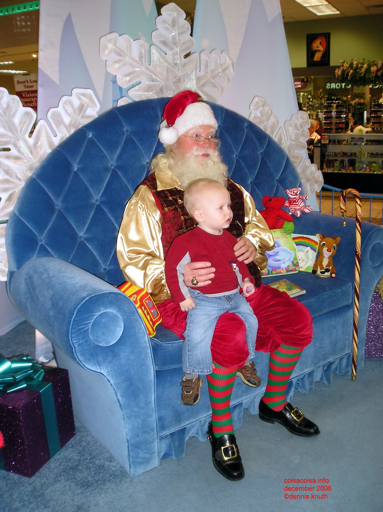 Jared sits on Santa's laptop