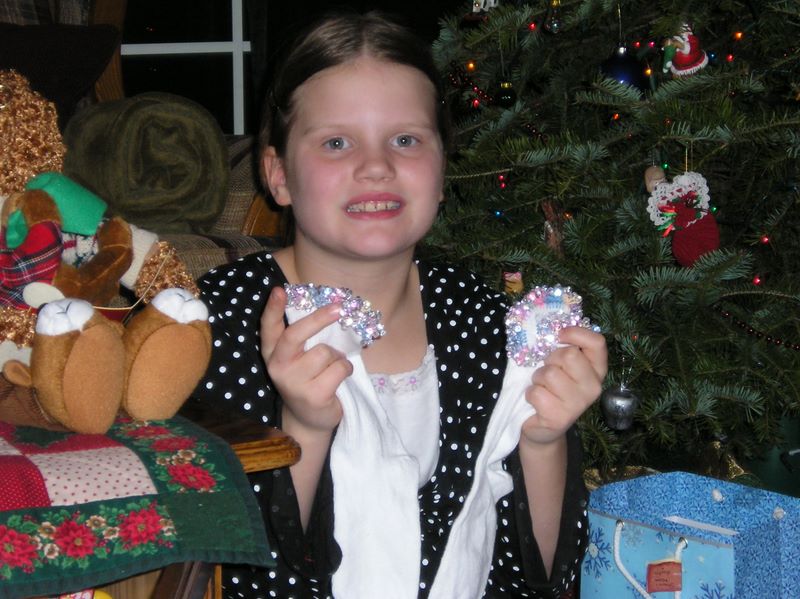 Show off your present to everyone Kelsey