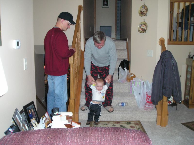 Dennis helps Jared down the stairs