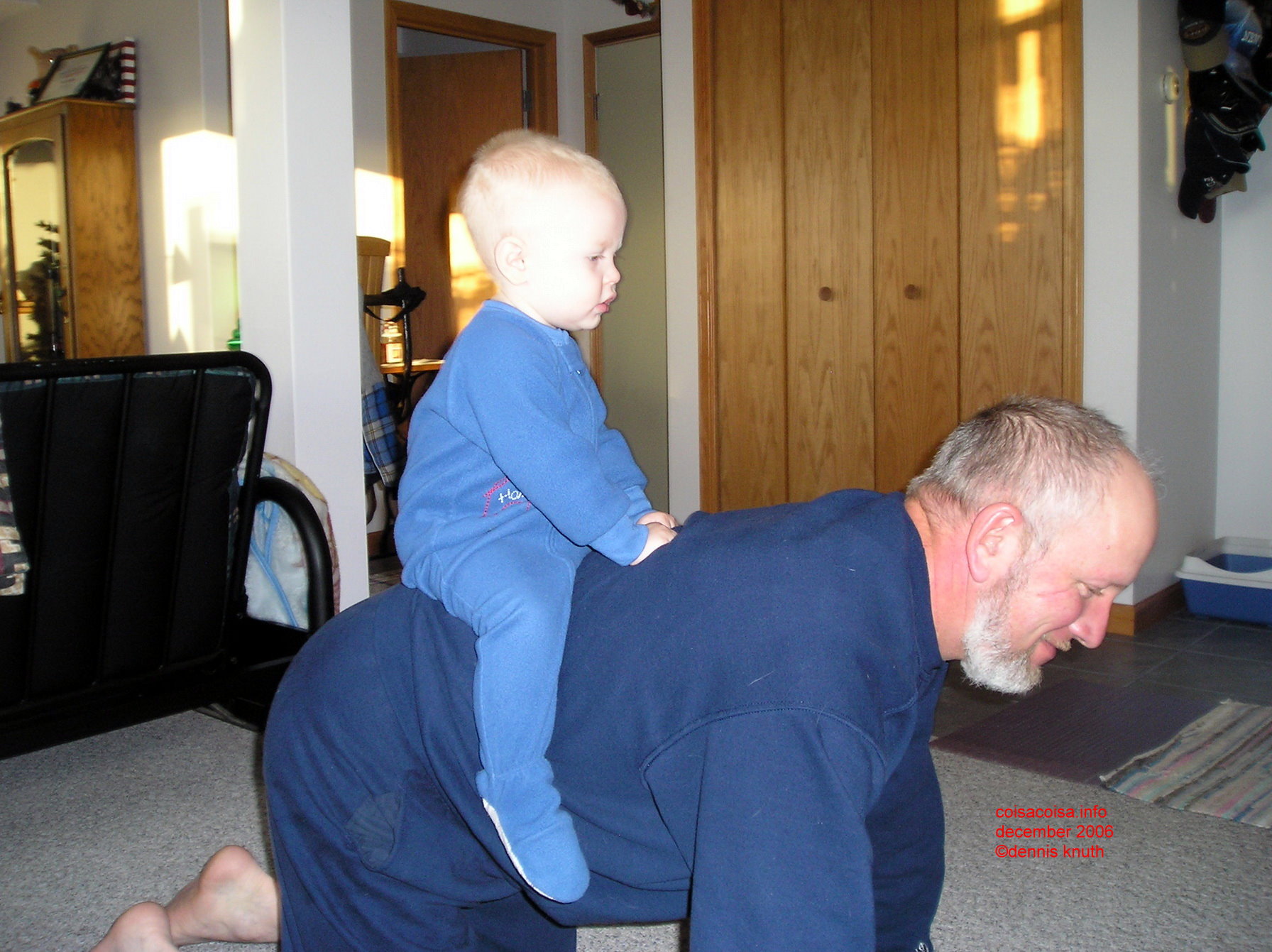 Grandfather give Grandson a ride