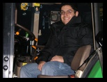 Raphael in Gary's John Deere Tractor