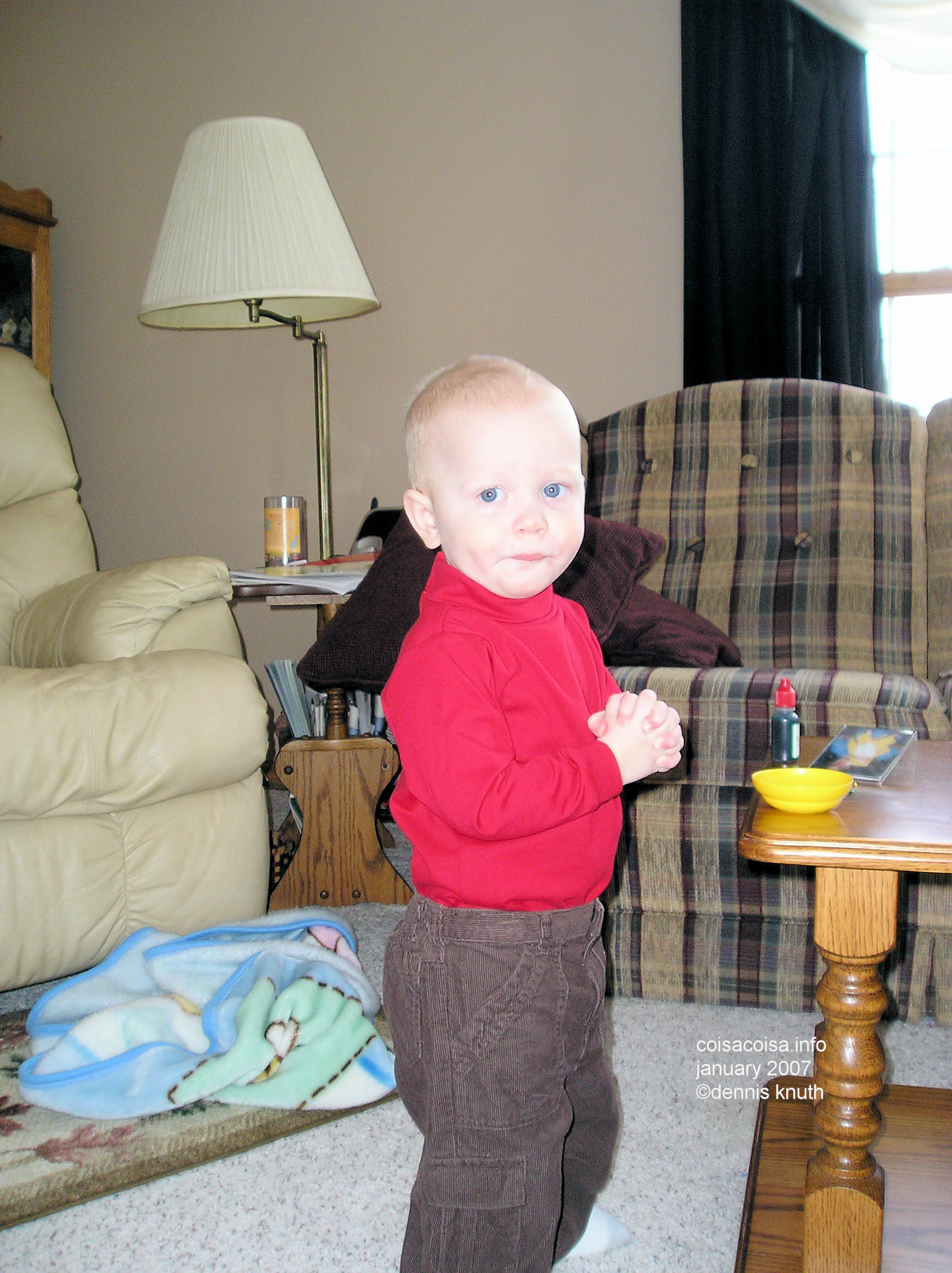 Grandma Sherri's living room Jared is ewildered and standing