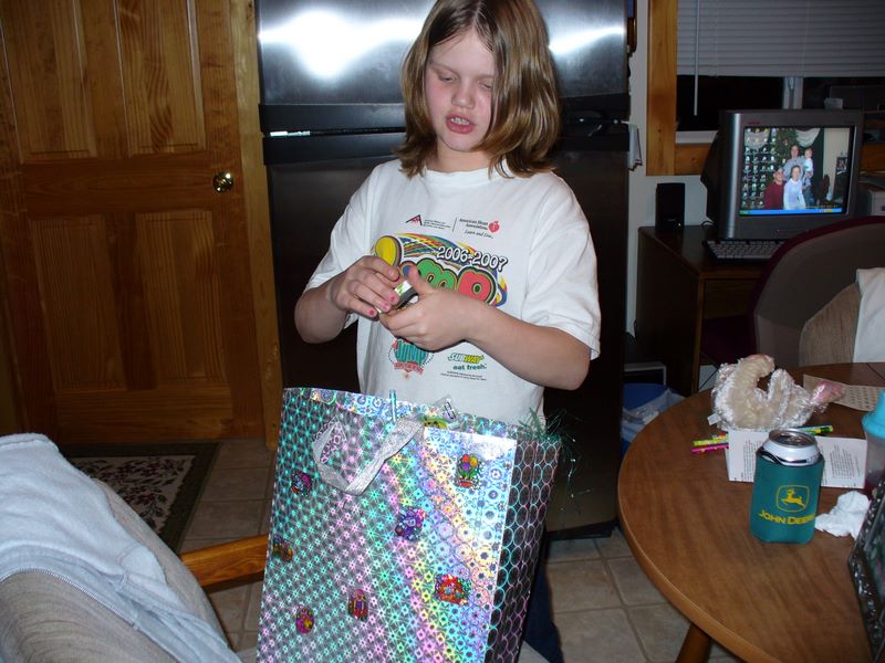 Kelsey examines a toy