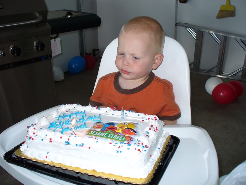 Jared with a candle blowout expression