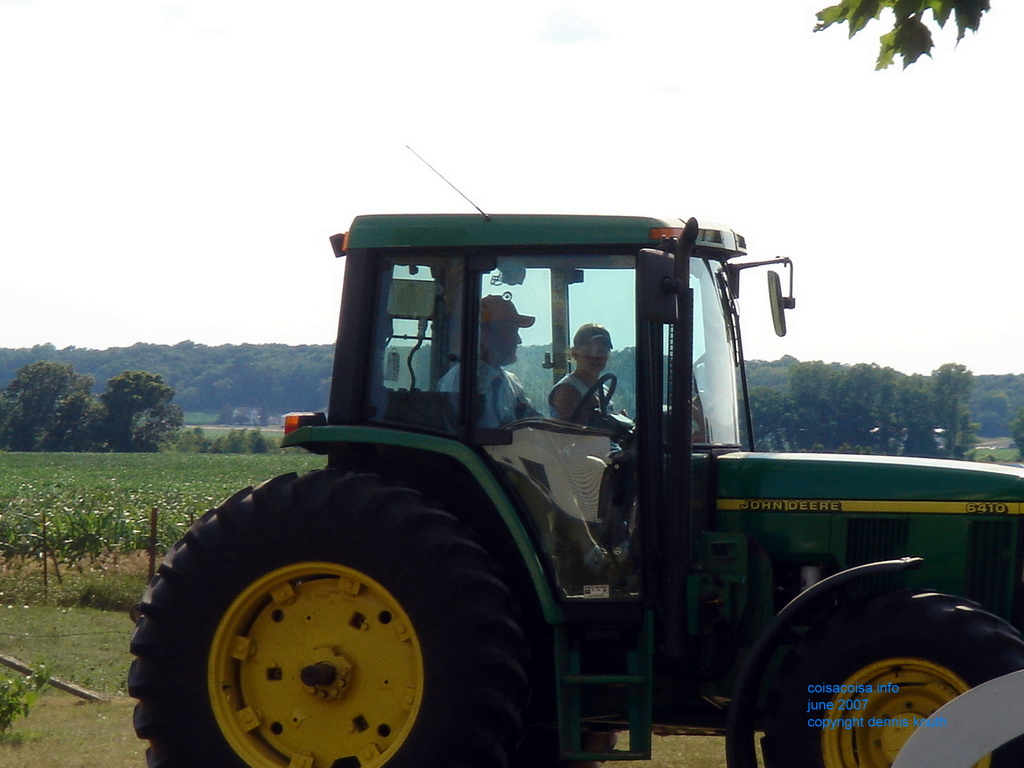 Showing Jared how he drives a tractor