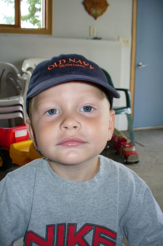 Jared Mugging with a baseball hat