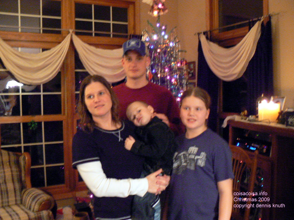 Moore family in front of the tree