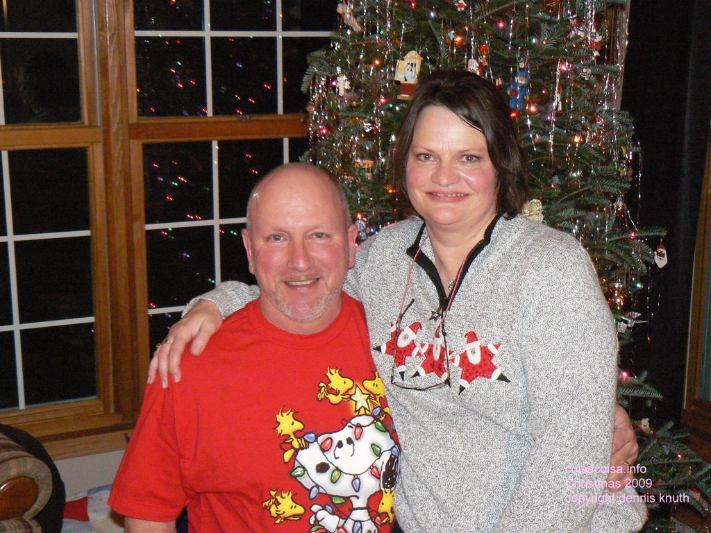 Dancing peg leg Santas and Sherri and Gary