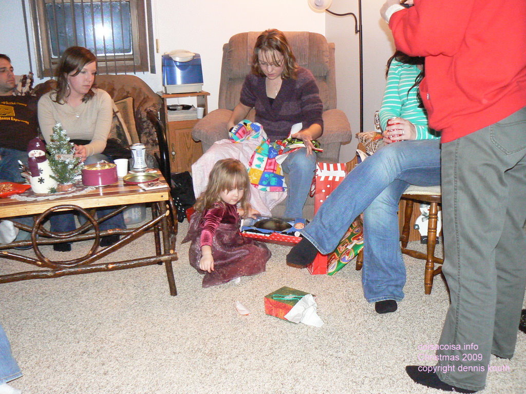 Opening gifts at Karen Saxe home
