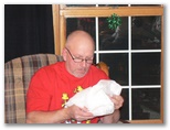 Gary at Christmas Season 2008 Opening a gift