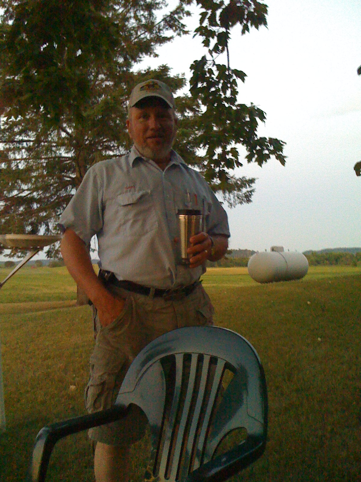 Gary having a cooling beverage on the farm