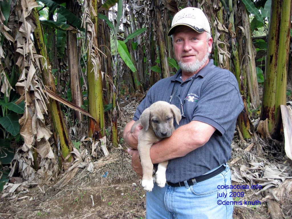 Gary pets the puppy in Brazil