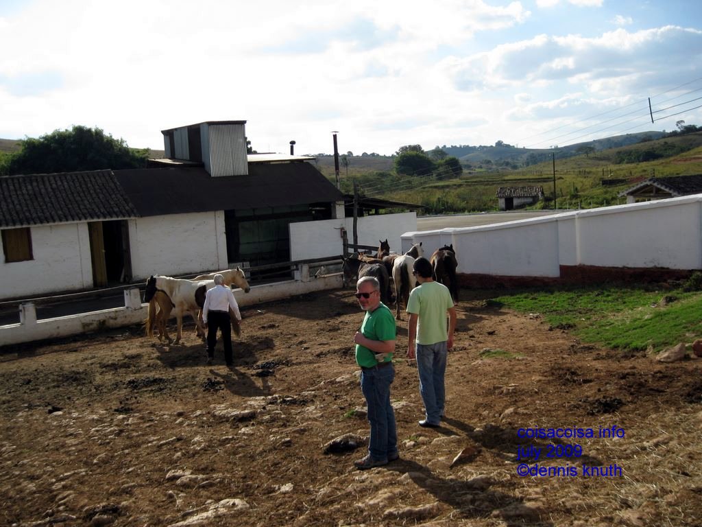 Bruno and Dennis wait for a horse to be picked