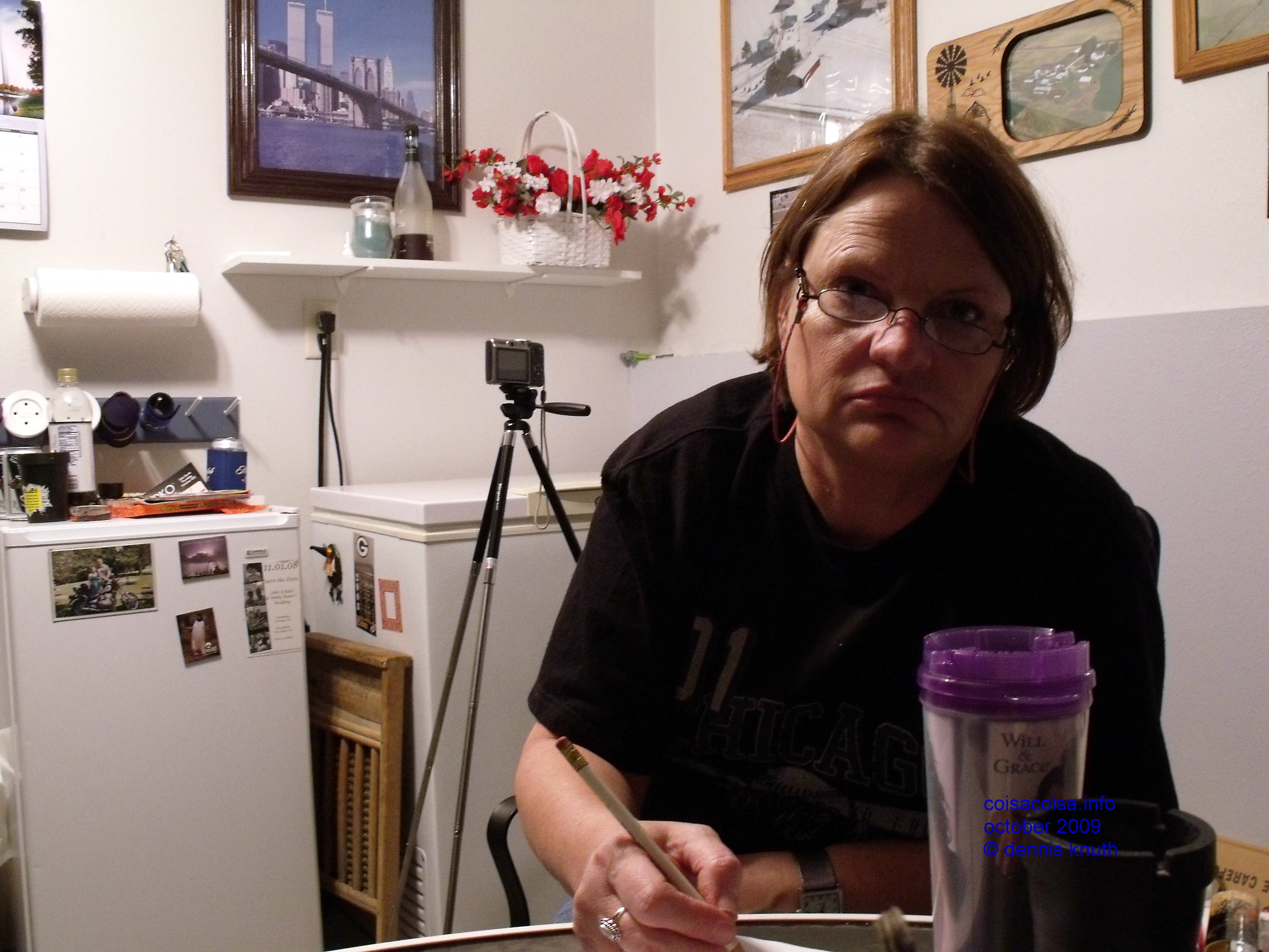 Sherri paying some bills on Halloween