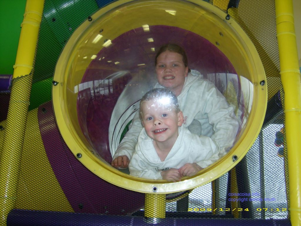 Kelsey and Jared in the looking glass