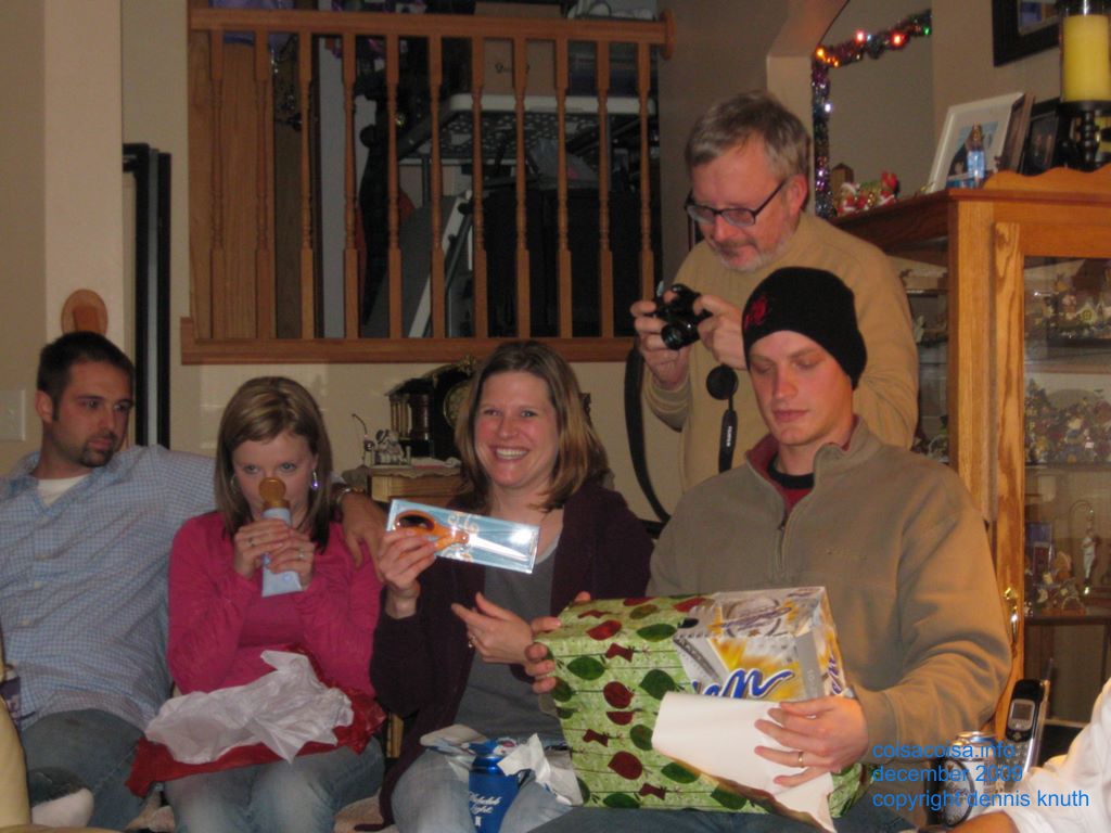 Dennis tinkers with his camera