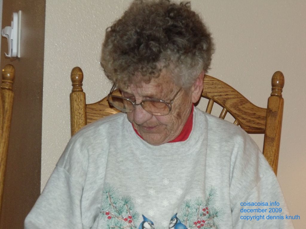 Great grandma Emogene gives her gift a good lookover