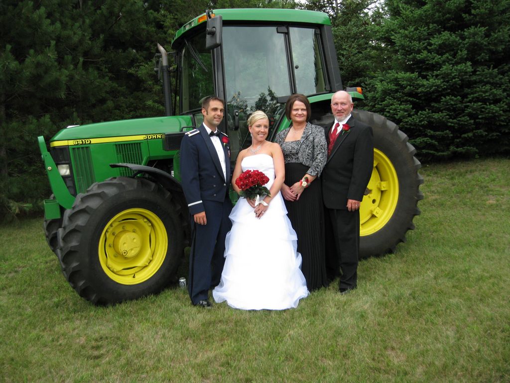 Parents Newlyweds and the tractor