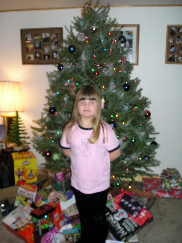 Kelsey by her Christmas Tree