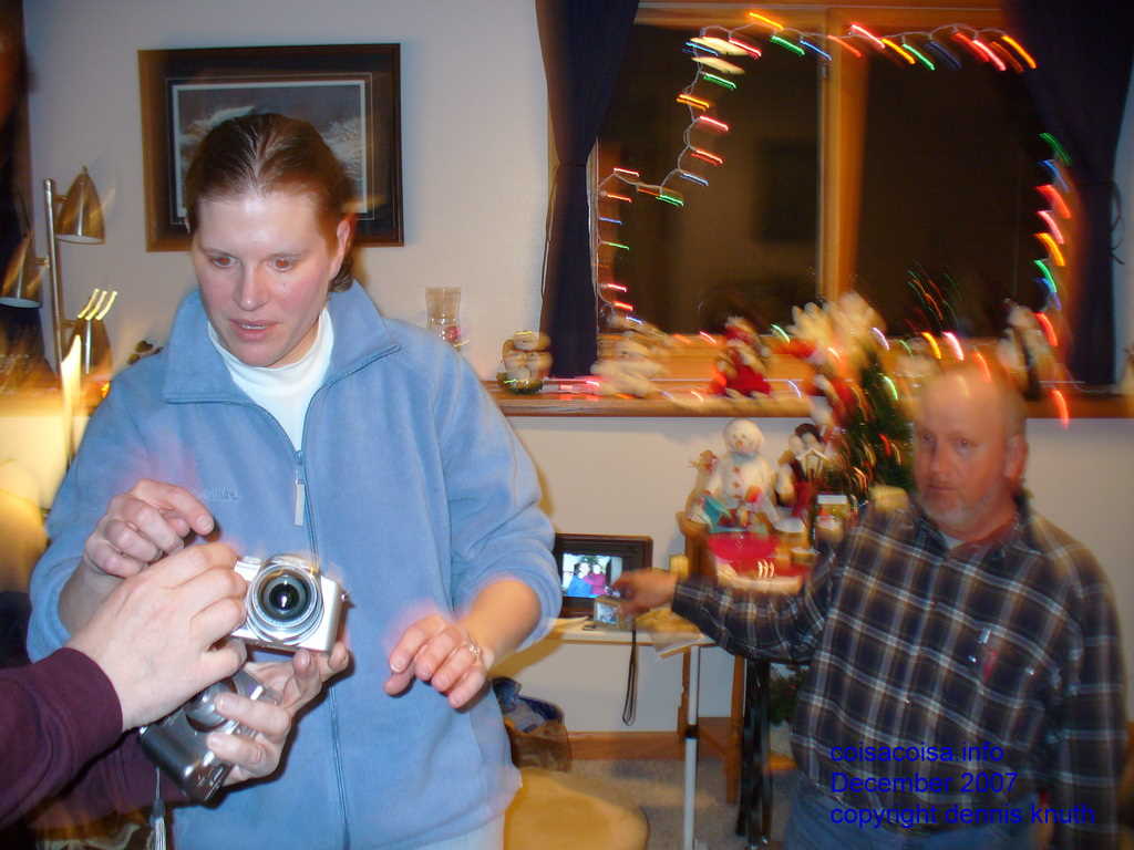 Dennis shows Kelly which button to push