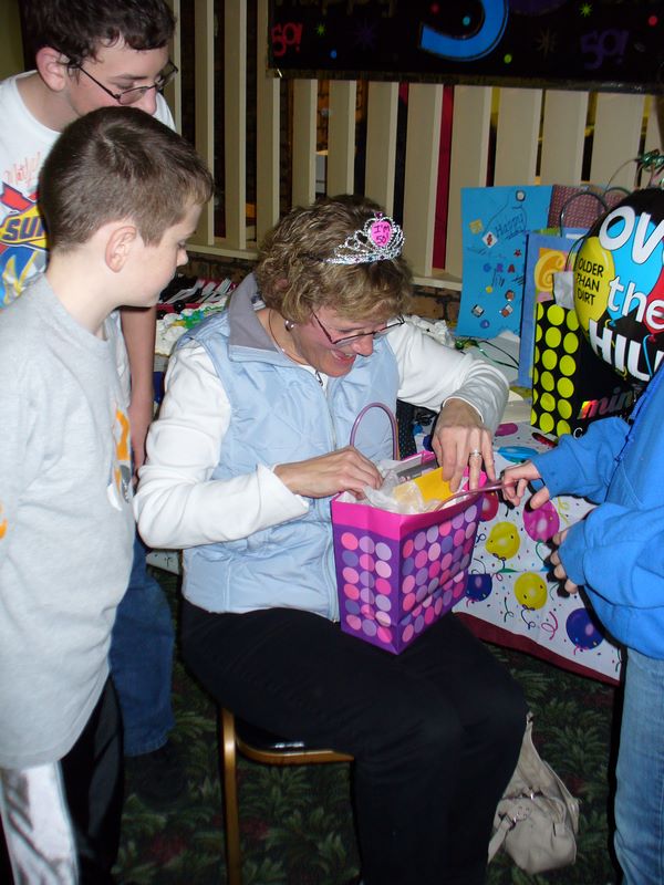 Beth digs into her birthday gift bag