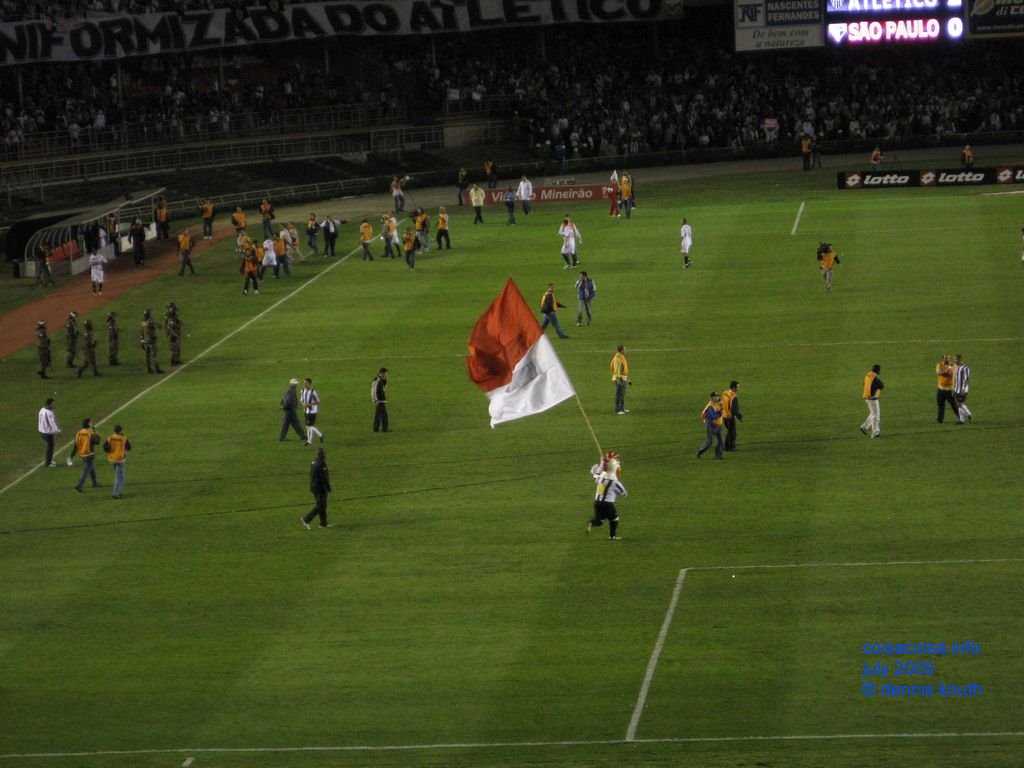 Galo mascot running across the Soccer Field in Belo Horizonte Brazil