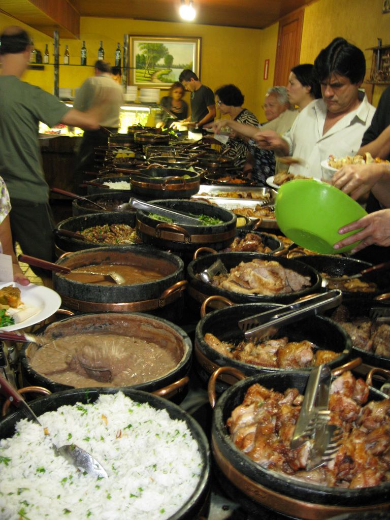 Too many food choices at a Brazilian buffet