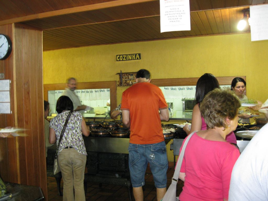 Heloisa Nem Figeirdo gets her lunch in the Cozinha