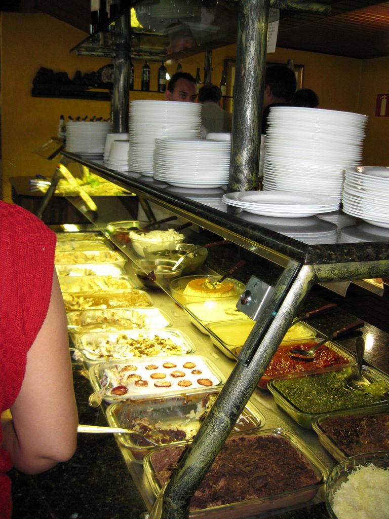 Plates above the steam table in Belo Horizonte at Chalel Mineiro