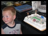 Blue eyed Jared and his birthday cake