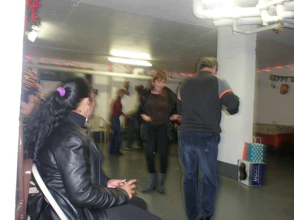 Helton and Lisette Dancing at the Elmhurst Towers party