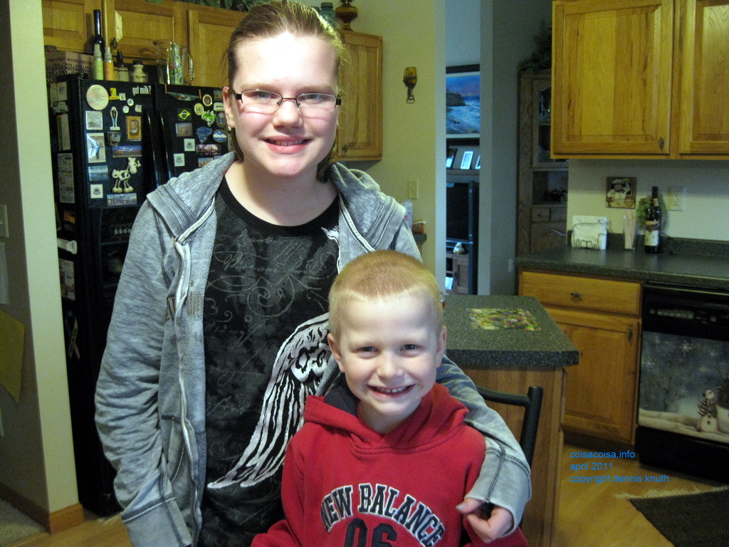 Sister Kelsey and Brother Jared coloring eggs