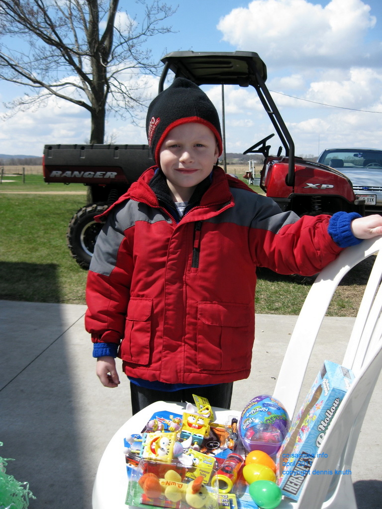 Showing off the treasures found on the Easter Egg Hung