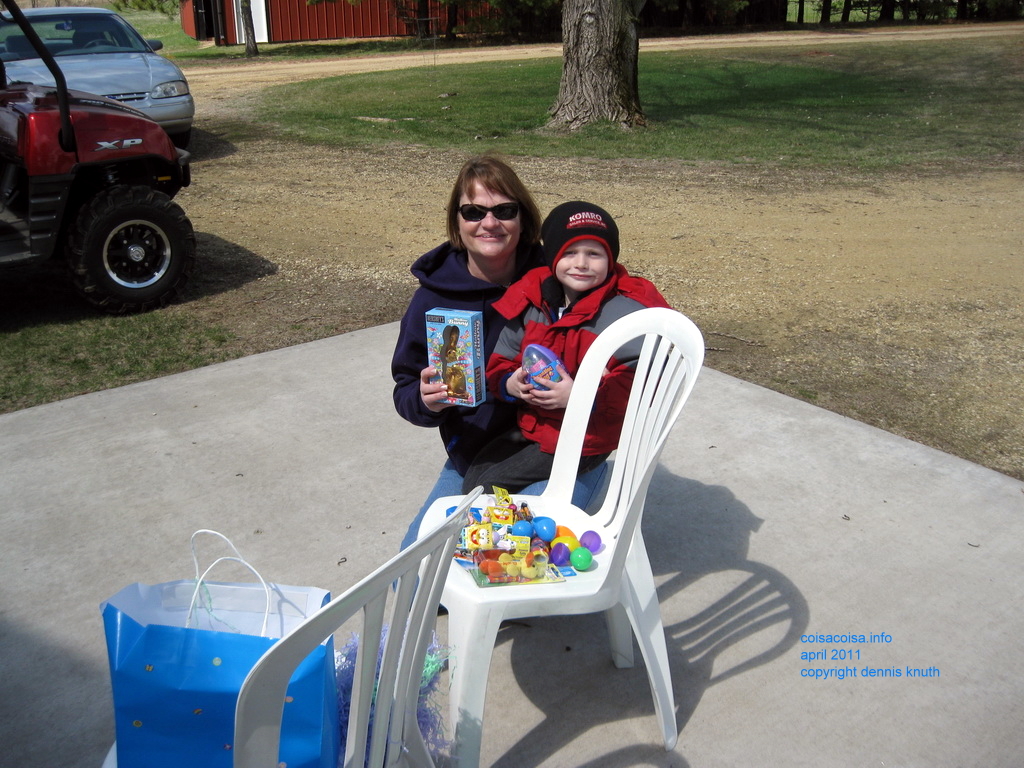 Grandmother Sherri and Jared showing off found treasures