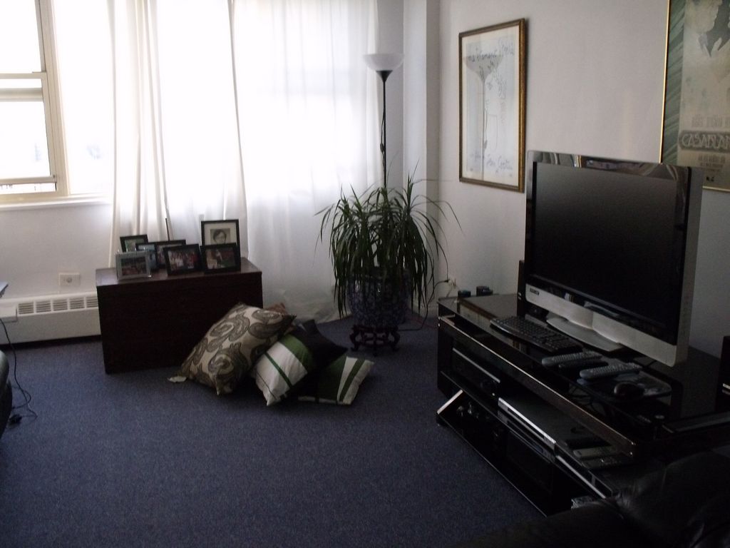 Antiques and throw pillows give accents