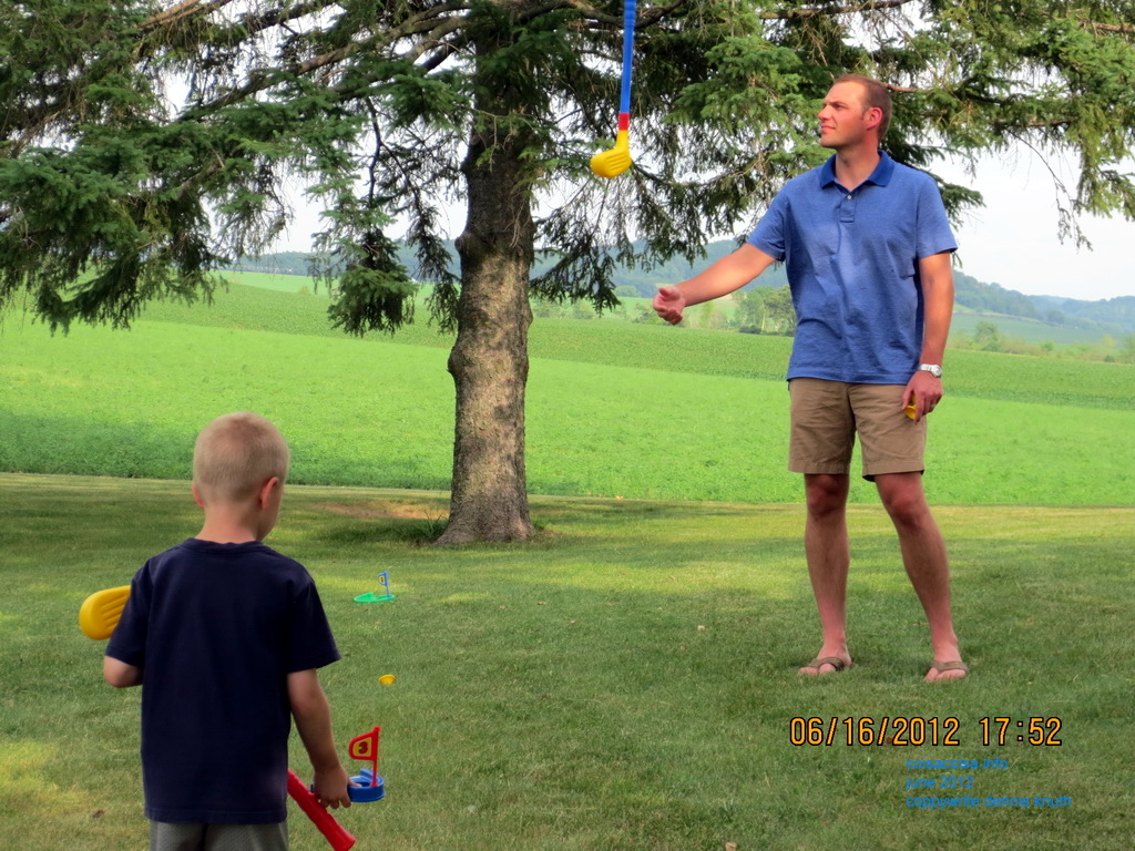 Justin and Jared golf on a Durand farm