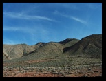 Wisp of clouds on the painted desert hills