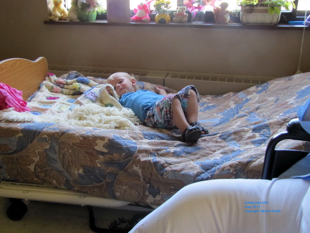 Colin naps on Great Grandfather John's Bed
