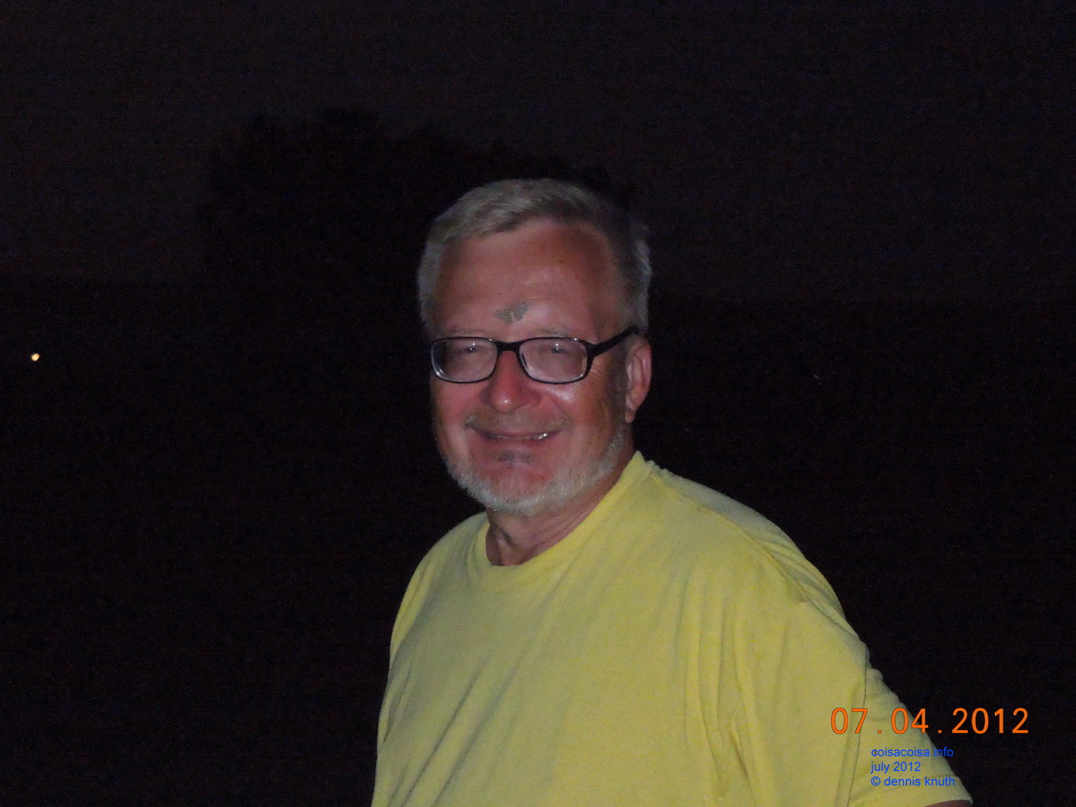 Dennis and butterfly in the middle of his forehead