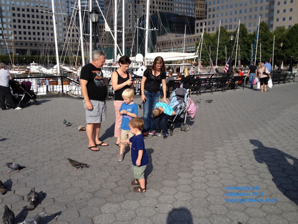 Dennis and Julia look down for a restaurant downtown