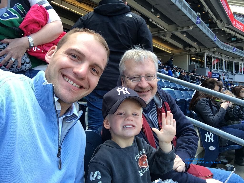 Colin Justin and Dennis wave for a selfie