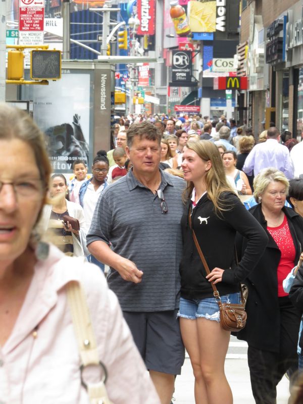 Tom and Abbey stroll on Broadway in New York City