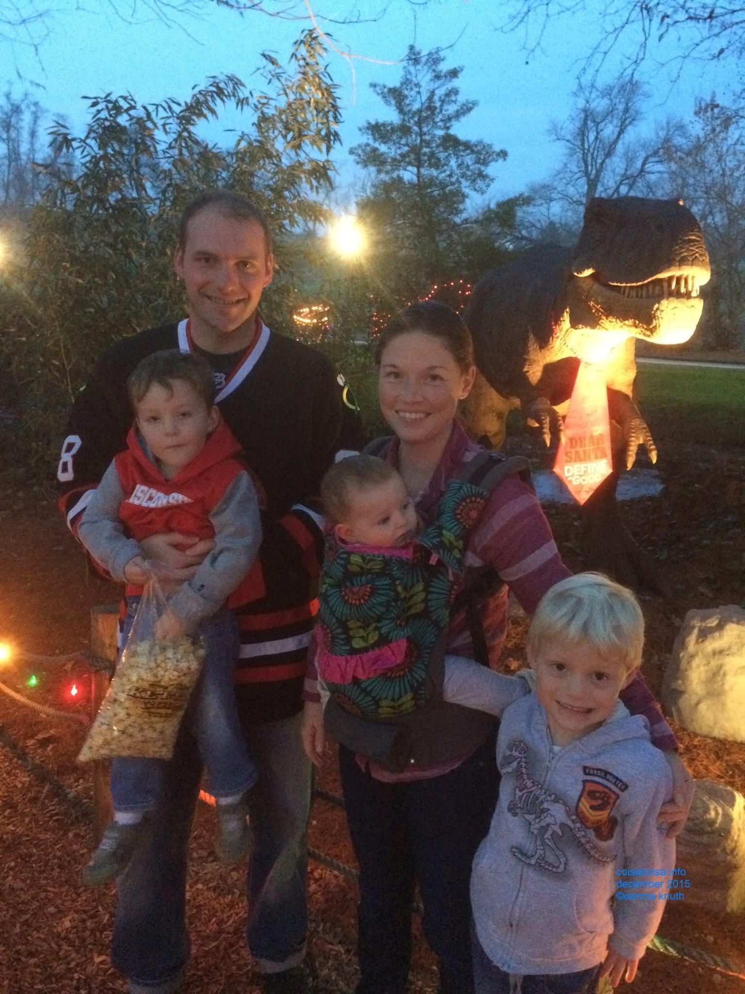 Justin and July with their family on a Christmas Card