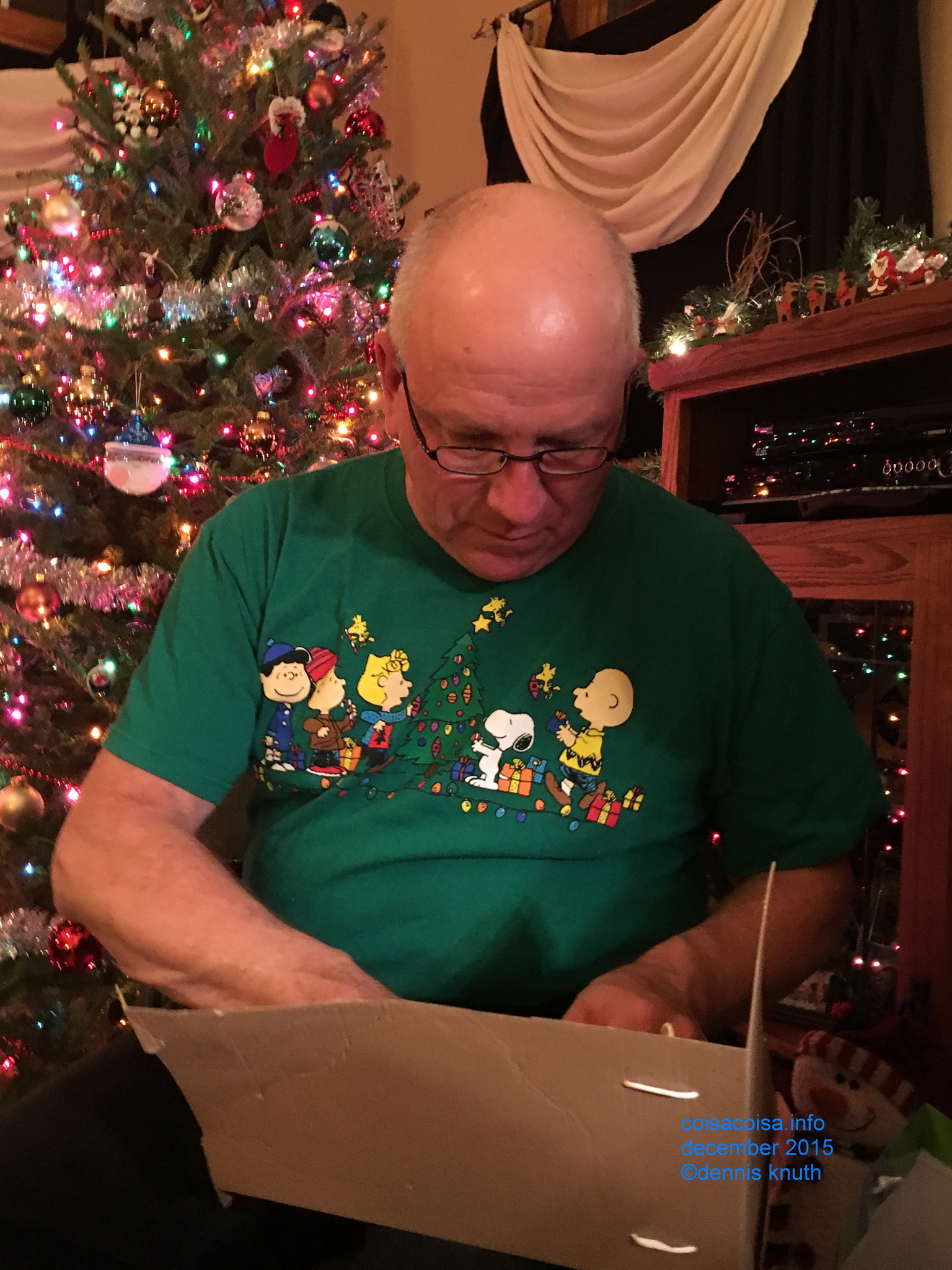 Garys opens a box with a gift for him