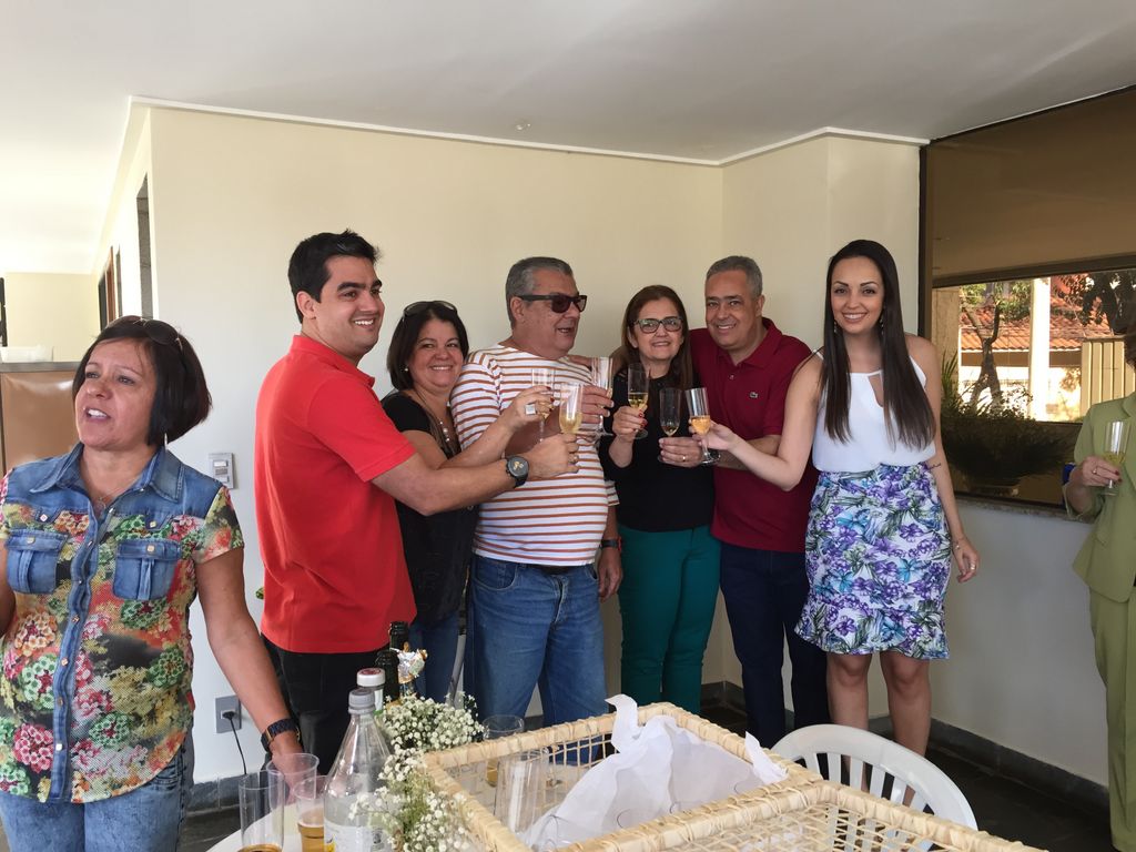 Parents toast the engaged couple