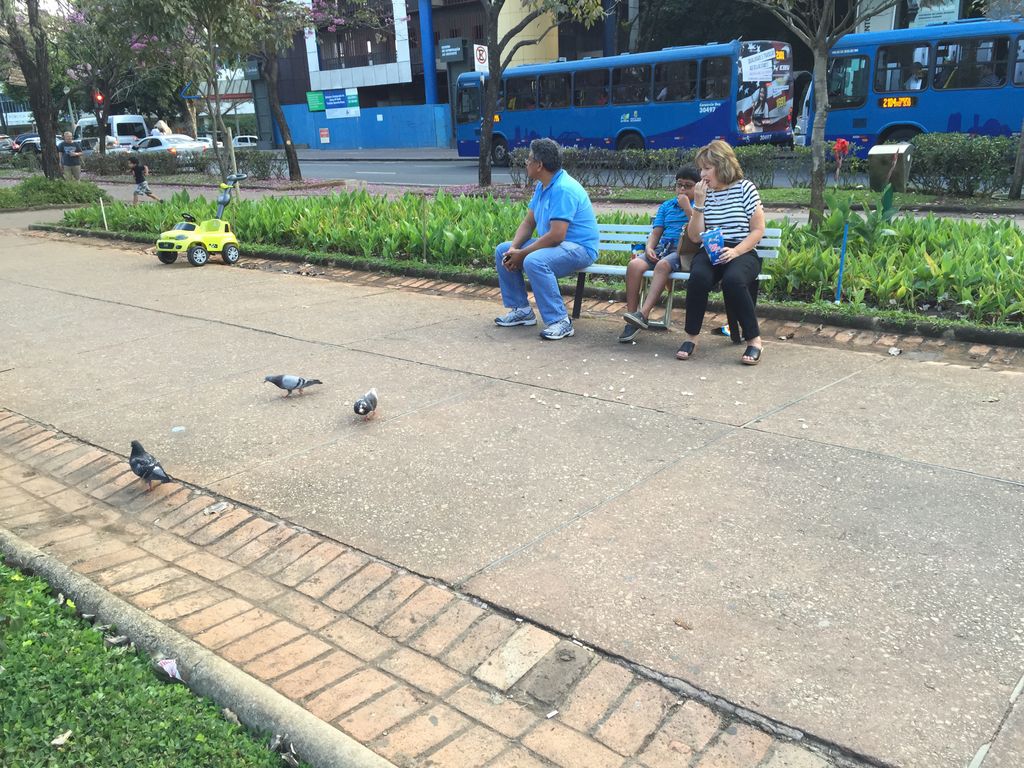 Sharon and Connor feeding pigeons