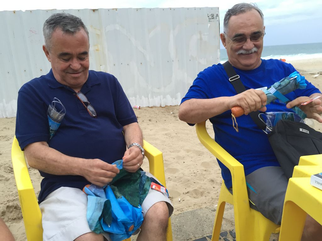 Helton and George fixing our umbrellas