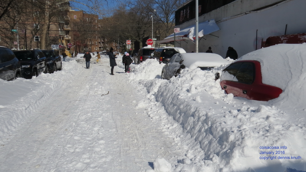 Our car is buried. Street has been plowed