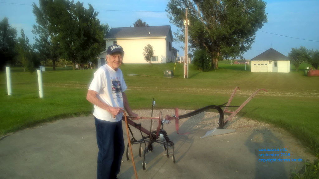 Emogene with Antique Farm Equipment